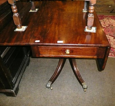 Lot 576 - A Regency mahogany pedestal Pembroke table