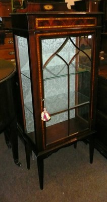 Lot 579 - An Edwardian inlaid mahogany display cabinet