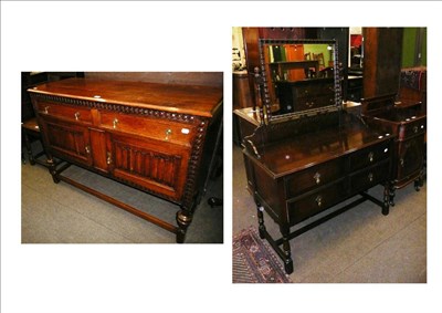 Lot 589 - A late Victorian mahogany pot cupboard, an oak sideboard, a joint stool and an oak dressing table