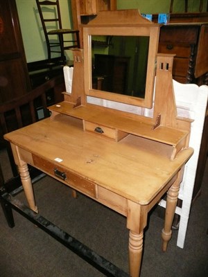 Lot 595 - An Arts & Crafts pine dressing table