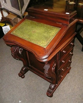 Lot 614 - A Victorian walnut Davenport