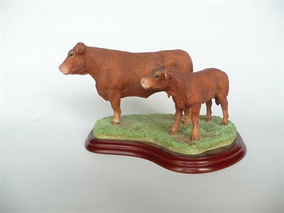 Lot 1044 - Border Fine Arts 'Limousin Cow and Calf' style three, model No. A1250 by Lesley McKenzie, 14cm high