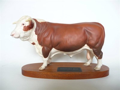 Lot 1063 - Beswick Hereford Bull on wood plinth, model No. A2542A, brown and white satin matt, 19.1cm high