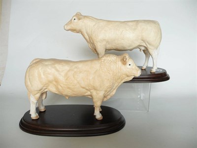 Lot 1066 - Shebeg Charolais Bull and Cow by John Harper, Isle of Man, both cream with matt glaze, bull...