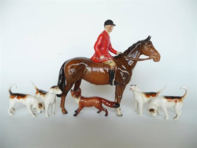 Lot 1089 - Beswick Mounted Huntsman on standing brown horse model No. 1501, gloss, 21cm high; Fox, small...