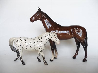 Lot 1092 - Beswick Appaloosa Pony, walking, model No. 1516, white with black spots, gloss, 13.3cm high...