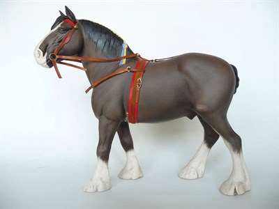 Lot 1095 - Beswick Clydesdale Horse in show harness, model No. 2465, dark brown matt, 27.8cm high (harness...