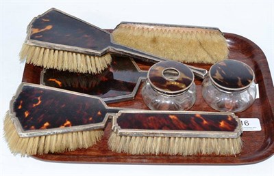 Lot 16 - Silver and tortoiseshell seven piece Art Deco style brush set