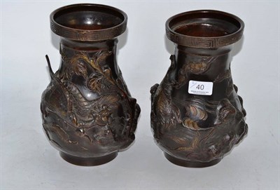 Lot 40 - A pair of bronzed Oriental vases