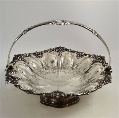 Lot 48 - A Victorian engraved cake basket