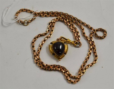 Lot 59 - A guard chain (swivel stamped '9c'), with Victorian fob set with a carbuncle garnet