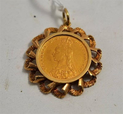 Lot 61 - A full sovereign dated 1889, within a 9ct gold setting