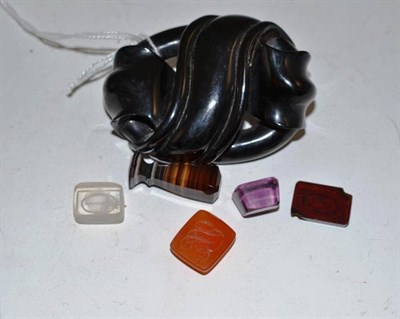 Lot 70 - A jet brooch, four intaglios and a sardonyx seal