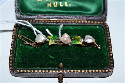 Lot 91 - A pearl and enamel bar brooch