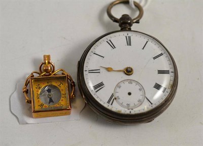 Lot 103 - A compass charm and a silver pocket watch