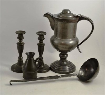 Lot 150 - Pewter wine jug, pair of 19th century candlesticks, spirit measure and an 18th century pewter ladle