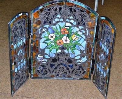 Lot 158 - A decorative three panel stained glass firescreen