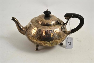 Lot 175 - Hammered silver teapot, London PE & Sons