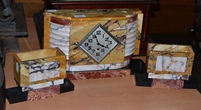 Lot 177 - An Art Deco marble clock garniture