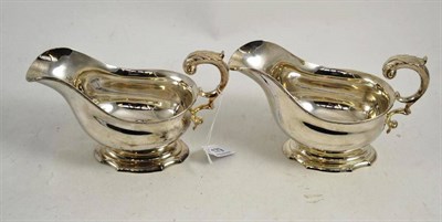 Lot 179 - Pair of silver sauce boats