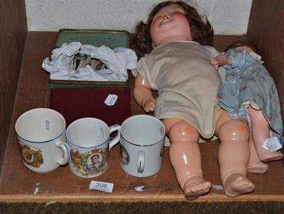 Lot 206 - Two dolls, three Coronation mugs, plated coffee spoons and a tin of cigarette cards