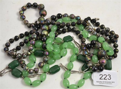 Lot 223 - A Venetian glass beaded necklace, green glass beaded necklace and a hardstone white metal...