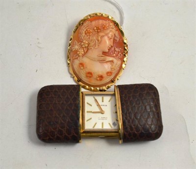 Lot 244 - A cameo brooch and a Movada watch