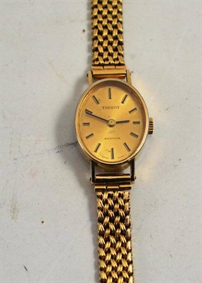 Lot 267 - A lady's 9ct gold wristwatch with mesh link bracelet