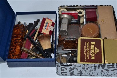 Lot 282 - Two boxes of collectables including fountain pens, a pair of bone opera glasses etc