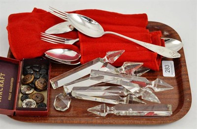 Lot 283 - A quantity of plated spoons, a quantity of cut glass lustres and a quantity of horseshoe buttons