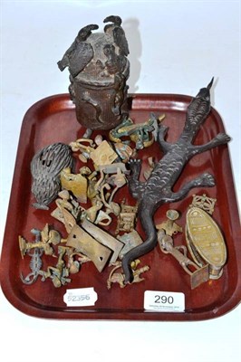 Lot 290 - A tray of assorted West African gold weights, casket, lizard etc