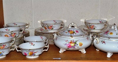 Lot 299 - A Royal Crown Derby nine plate dinner service decorated with floral sprays, including two tureens