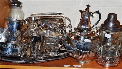 Lot 300 - A shelf of silver plated ware including Old Sheffield Plate chamberstick, entree dishes, tray,...