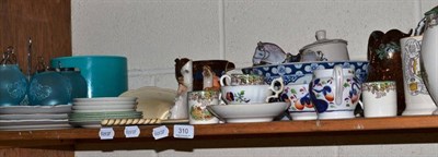 Lot 310 - A shelf of assorted decorative pottery including Staffordshire figures, copper lustre, tea...