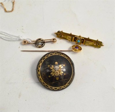 Lot 326 - A tortoiseshell pique brooch, two bar brooches and an amethyst tie pin (4)