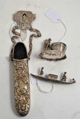 Lot 339 - Embossed silver spectacle case with chatelaine chain and mount; small silver model of a figure with