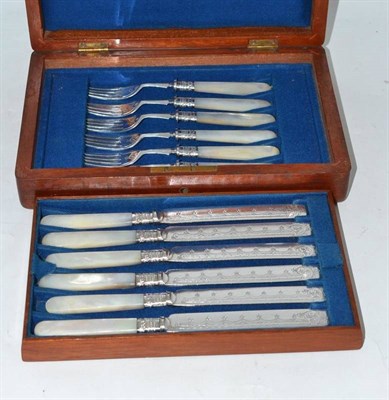 Lot 351 - A set of six plate and mother-of-pearl fruit knives in a mahogany case