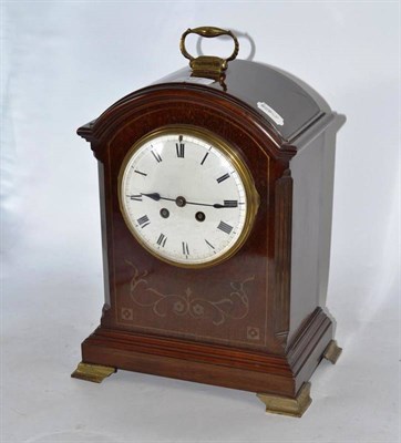 Lot 377 - A mahogany striking mantel clock