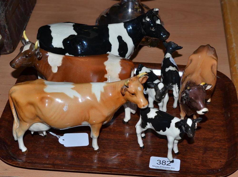 Lot 382 - Four Beswick cows, Ayrshire, Friesian, Jersey and Guernsey and three Friesian calves