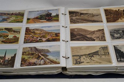 Lot 387 - Large quantity of postcards in a blue album