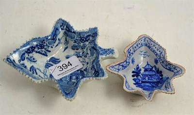 Lot 394 - A Willow pattern pickle dish and a Delft example