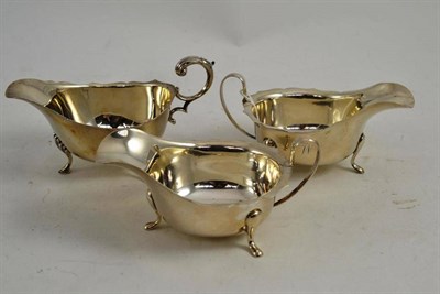 Lot 400 - A pair of silver sauce boats and another inscribed Bramham Moor, 1934, 2nd Prize Bitch Hounds (3)