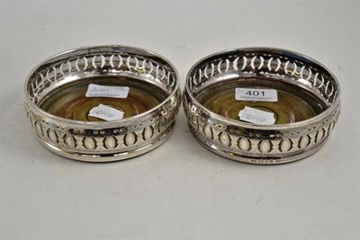 Lot 401 - Pair of silver coasters with pierced decoration