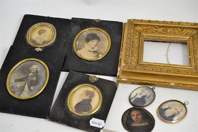 Lot 413 - Two 18th century miniature portraits of gentlemen, five other miniature portraits and a frame (8)