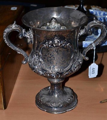 Lot 449 - An embossed silver trophy cup