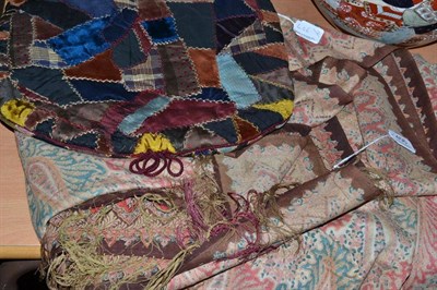 Lot 456 - Large printed paisley cloth and a 'crazy' patchwork tea cosy (2)