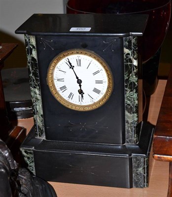 Lot 460 - A black slate and marble mantel timepiece