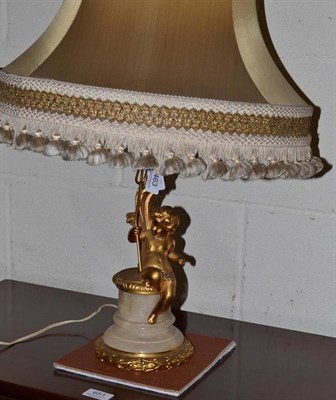 Lot 463 - Gilt metal mounted Cherub table lamp and shade