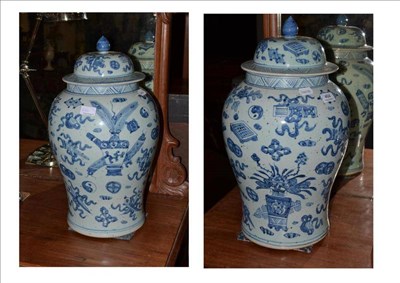 Lot 464 - Pair of blue and white vases and covers