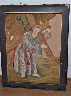 Lot 521 - An early 19th century embroidered picture, Jesus carrying the cross